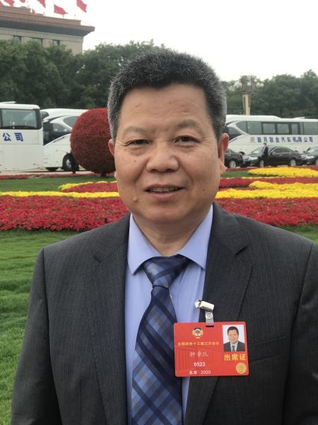 鐘章隊(duì)委員照片.jpg
